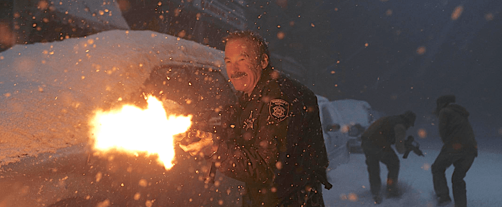 Normally nonaggressive Sheriff Ulysses (Bob Odenkirk) smokes some bad guys, in "Normal." (Magnolia Pictures)