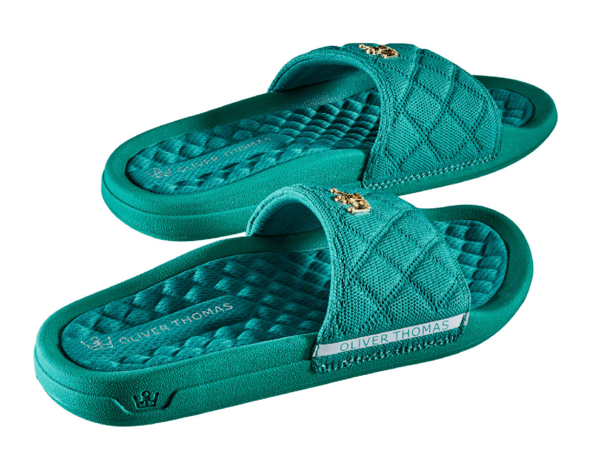 Oliver Thomas Wingwoman Comfort Recovery Slides ease you from a strenuous day of strolling to the spa or a poolside party, giving your feet a relaxing cuddle treat with a crowning touch of bling. (Photo courtesy of Oliver Thomas)