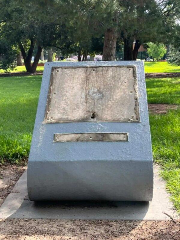 A defaced monument that commemorates Swedish diplomat Raoul Wallenberg who helped shield and rescue about 100,000 Jews during the Holocaust in World War II. The monument is located in Caulfield Park, Melbourne in Australia. (Courtesy of Australian Jewish Association)