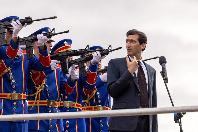 George Fahmy (Fares Fares) speaks at the Armed Forces parade, in "Eagles of the Republic." (SF Studios)
