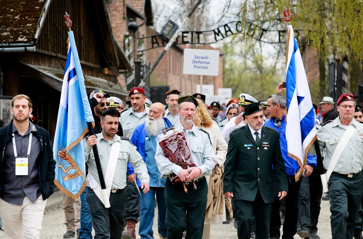 Day in Photos: Holocaust Victims Commemoration, Khmer New Year, and Blue Forest