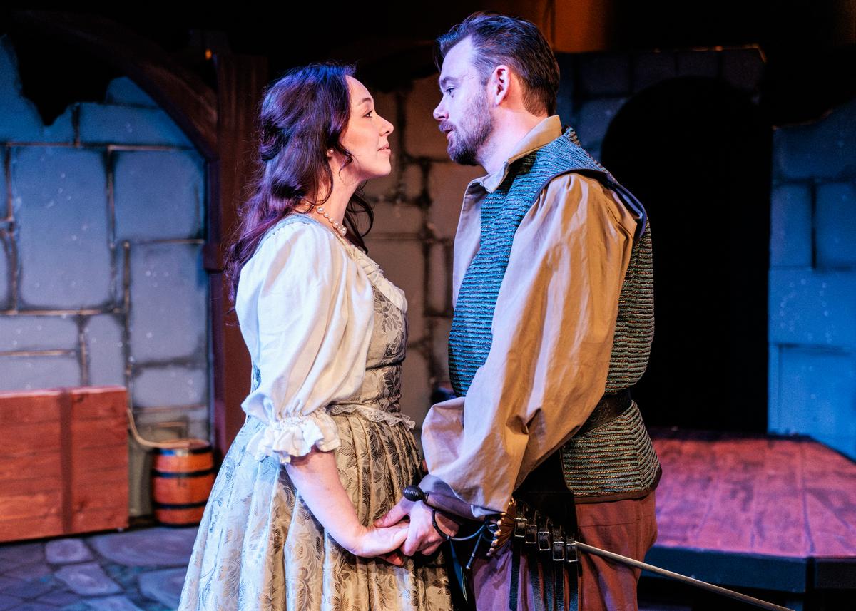 Constance (Jamie Redwood) trysts with D'Artagnan (Troy Schaeflein), in "The Three Musketeers." (Steven Townshend)