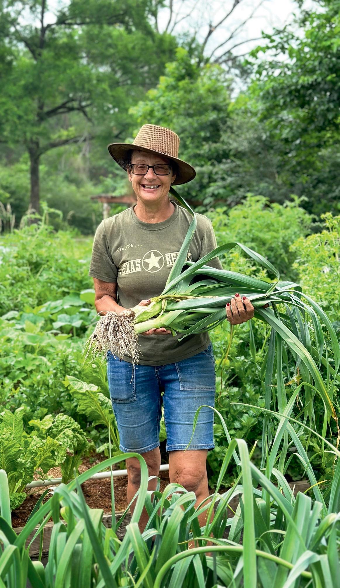 Bailey with American flag leeks from her garden. (Courtesy of Texas Ready)