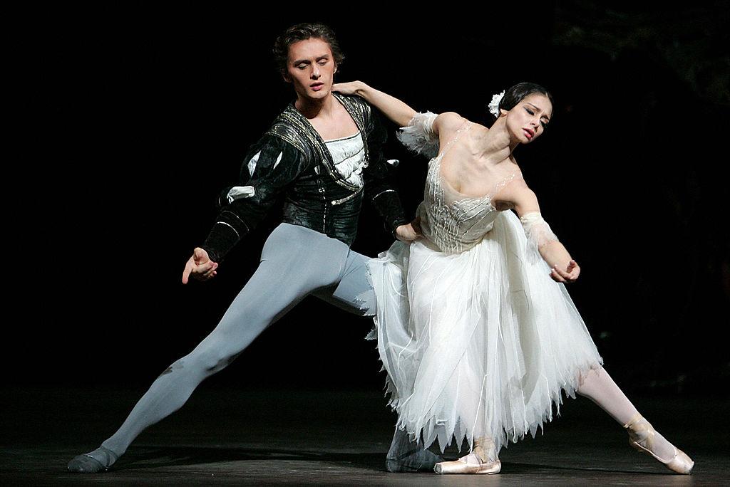 Albrecht (Ivan Putrov) and Giselle (Roberta Marquez) perform during a Royal Ballet dress rehearsal of "Giselle" in 2006 with Peter Wright's production and designs by John Macfarlane. (John D. McHugh/AFP via Getty Images)