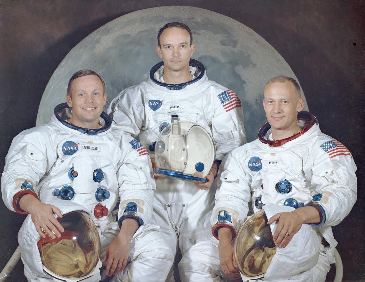 The official crew portrait of the Apollo 11 astronauts. Pictured left to right: Neil A. Armstrong, Commander; Michael Collins, Module Pilot; Edwin E. "Buzz" Aldrin, Lunar Module Pilot. (NASA)
