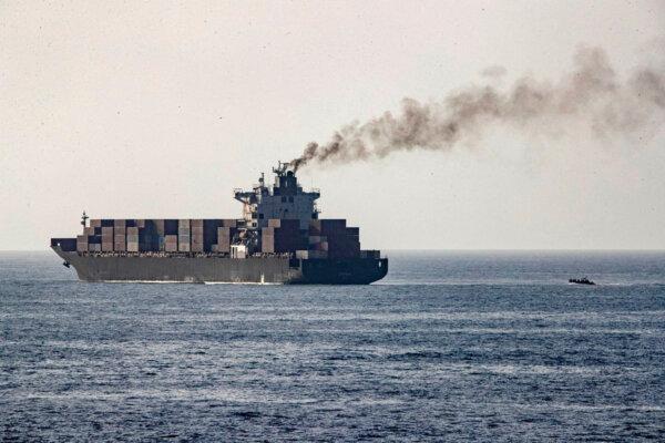 U.S forces patrol near the Iranian-flagged cargo ship M/V Touska after it was boarded and seized by U.S. forces, at a location given as the Arabian Sea, in this handout image released on April 20, 2026. (U.S. Central Command via X/Handout via Reuters)