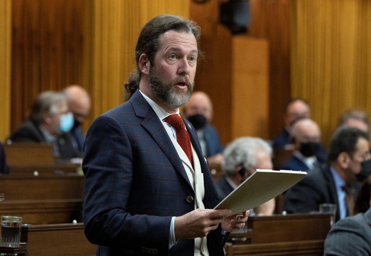 Conservative MP Scott Reid rises during Question Period in the House of Commons in Ottawa on Feb. 21, 2022. (The Canadian Press/Adrian Wyld)