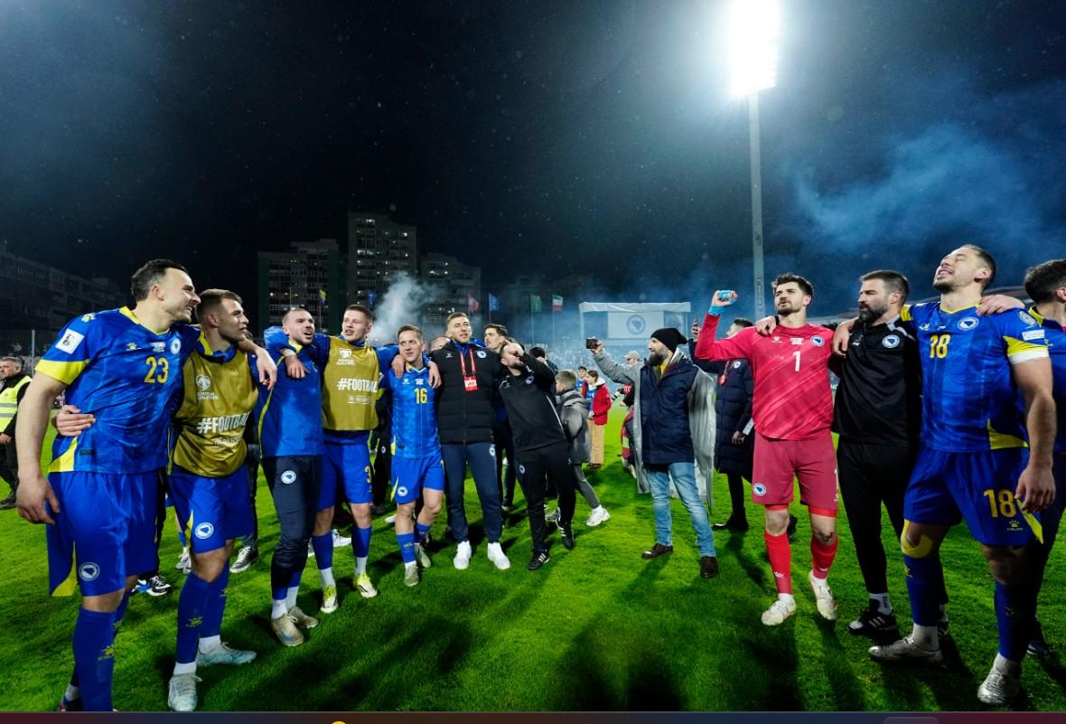 Bosnia and Herzegovina players celebrate after defeating Italy in a playoff match to qualify for the FIFA World Cup at Bilino Polje Stadium, Zenica, Bosnia and Herzegovina, on March 31, 2026. (Matteo Ciambelli/Reuters)