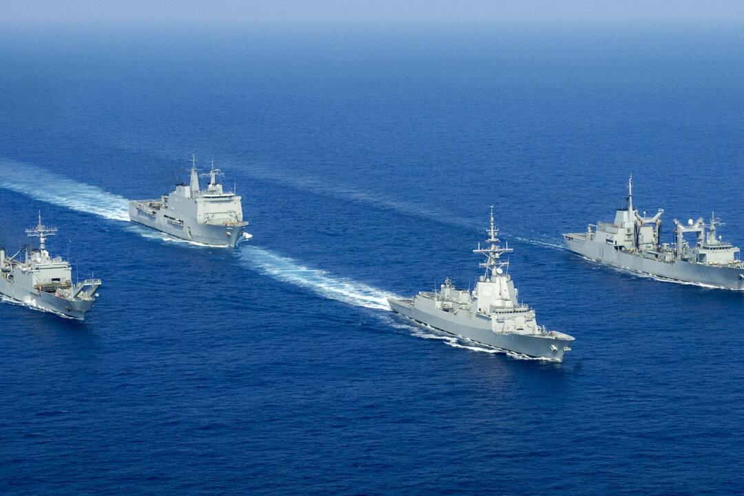 Spanish navy vessels carrying about 570 troops head to join the United Nations peacekeeping force in southern Lebanon on Sept. 12, 2006. (Pepe Diaz/AFP via Getty Images)