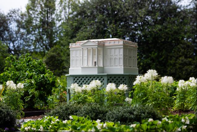 First Lady Melania Trump Unveils Miniature White House Shaped Beehive