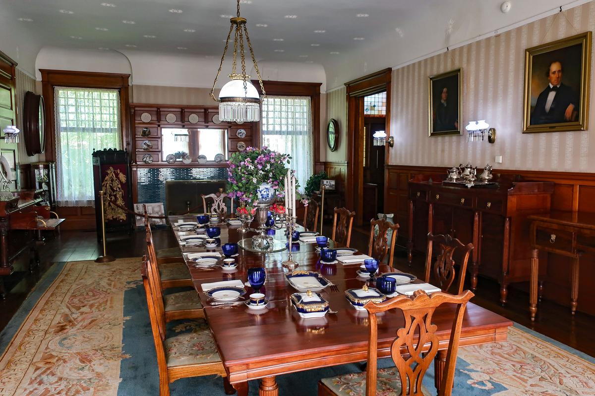 Lining the walls of the mansion’s long, rectangular dining room are sideboards that are used to display and store china, silverware, and serving pieces. Two, on the left side of the room, were originally in the White House and were saved from being burned during the War of 1812. Each of the Chippendale dining chairs has an embroidered seat cover. (Hayes Presidential Library & Museums)