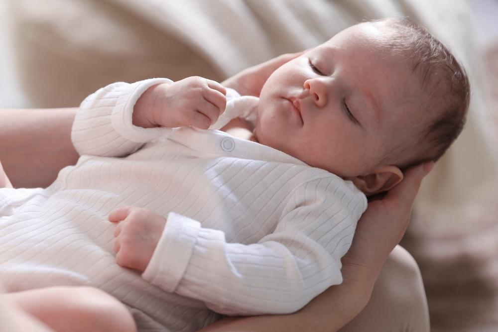 A baby needs extra sleep several months after birth. (New Africa/Shutterstock)