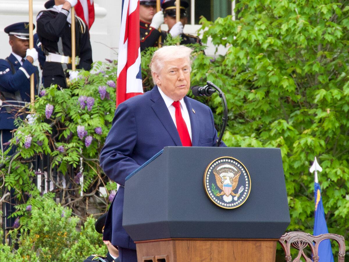 President Donald Trump speaks during a ceremonial state visit honoring King Charles III and Queen Camilla on the South Lawn of the White House on April 28, 2026. (Travis Gillmore/The Epoch Times)