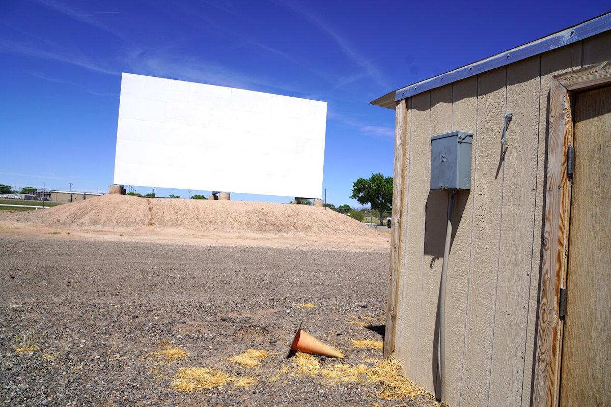 The digital projection booth at the Badlands Drive-In theater in Los Lunas, N.M., on April 24, 2026. (Allan Stein/The Epoch Times)