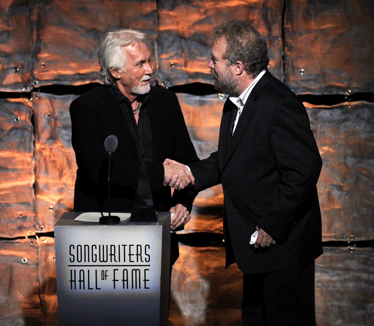 Kenny Rogers and inductee Don Schlitz at the 2012 Songwriters Hall of Fame award ceremony in New York City. (Timothy A. Clary/Getty Images)