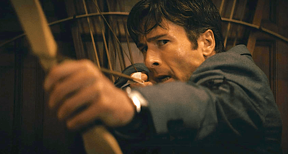 Becket Redfellow (Glen Powell) up to no good, in "How to Make a Killing." (Blueprint Pictures)