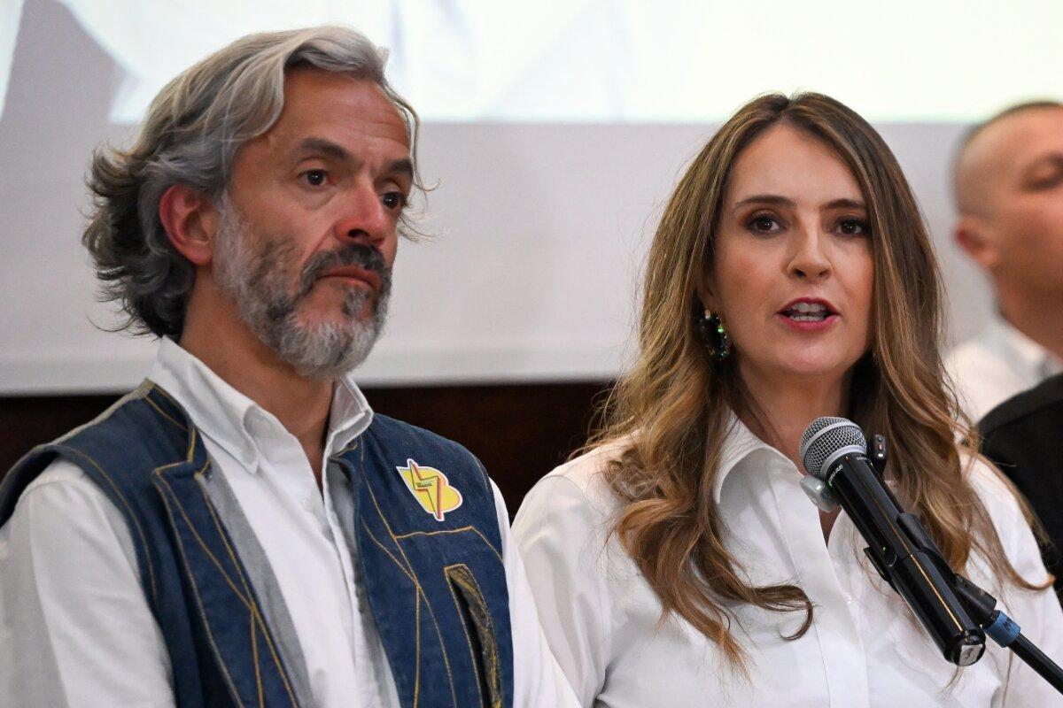 Colombian presidential candidate Paloma Valencia, of the Democratic Center party, speaks next to vice-presidential candidate Juan Daniel Oviedo after the release of voting results in the presidential election in Bogota, Colombia, on May 31, 2026. (Daniel MUNOZ/AFP)