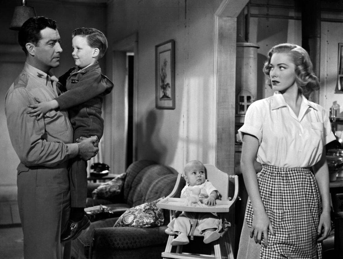 Lt. Col. Paul Tibbets (Robert Taylor) and wife Lucy (Eleanor Parker) with their children, in “Above and Beyond.” (Metro-Goldwyn-Mayer)