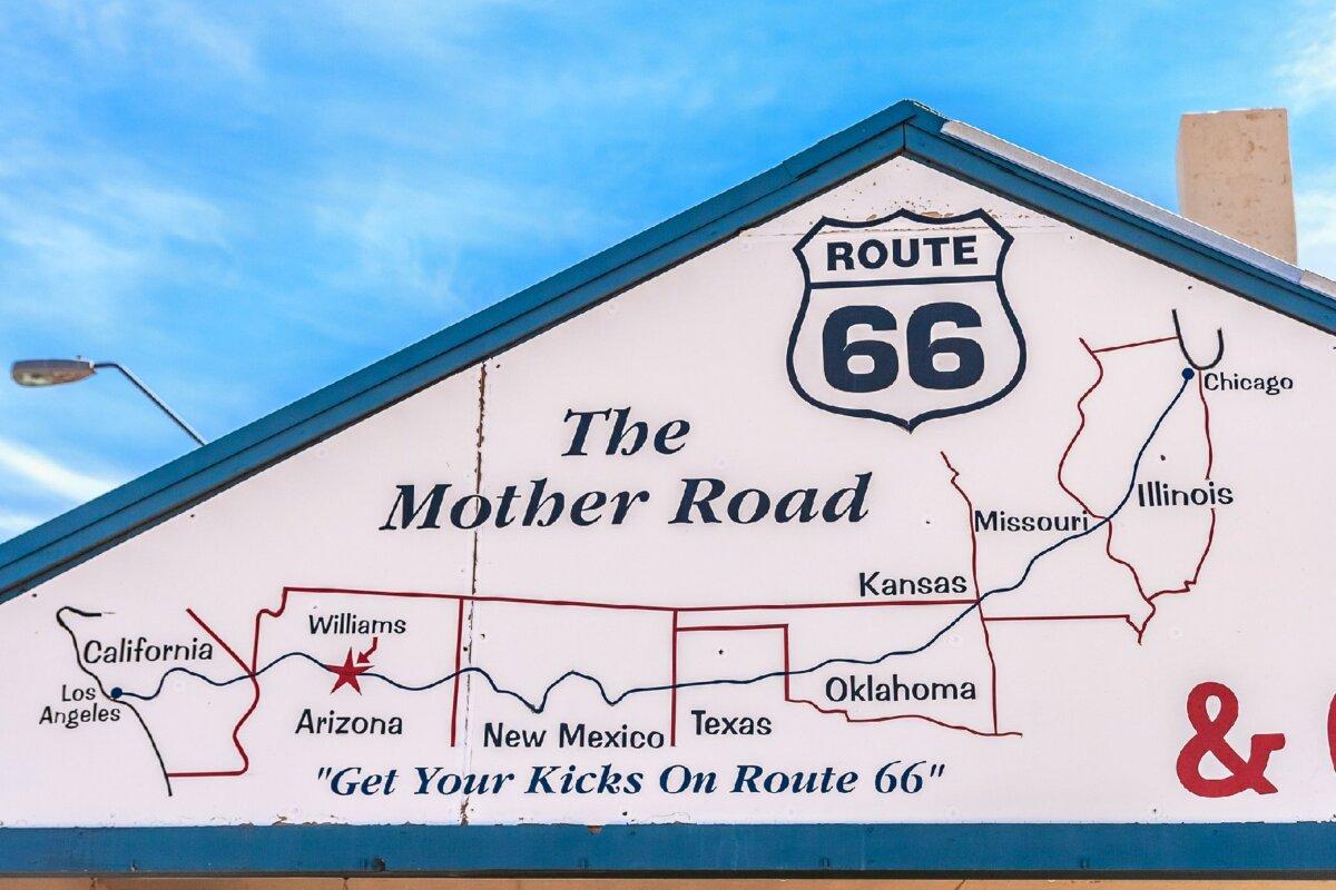A motel along Route 66 sports a map of the highway on its facade. (Photo courtesy of Matthieuclouis/Dreamstime)