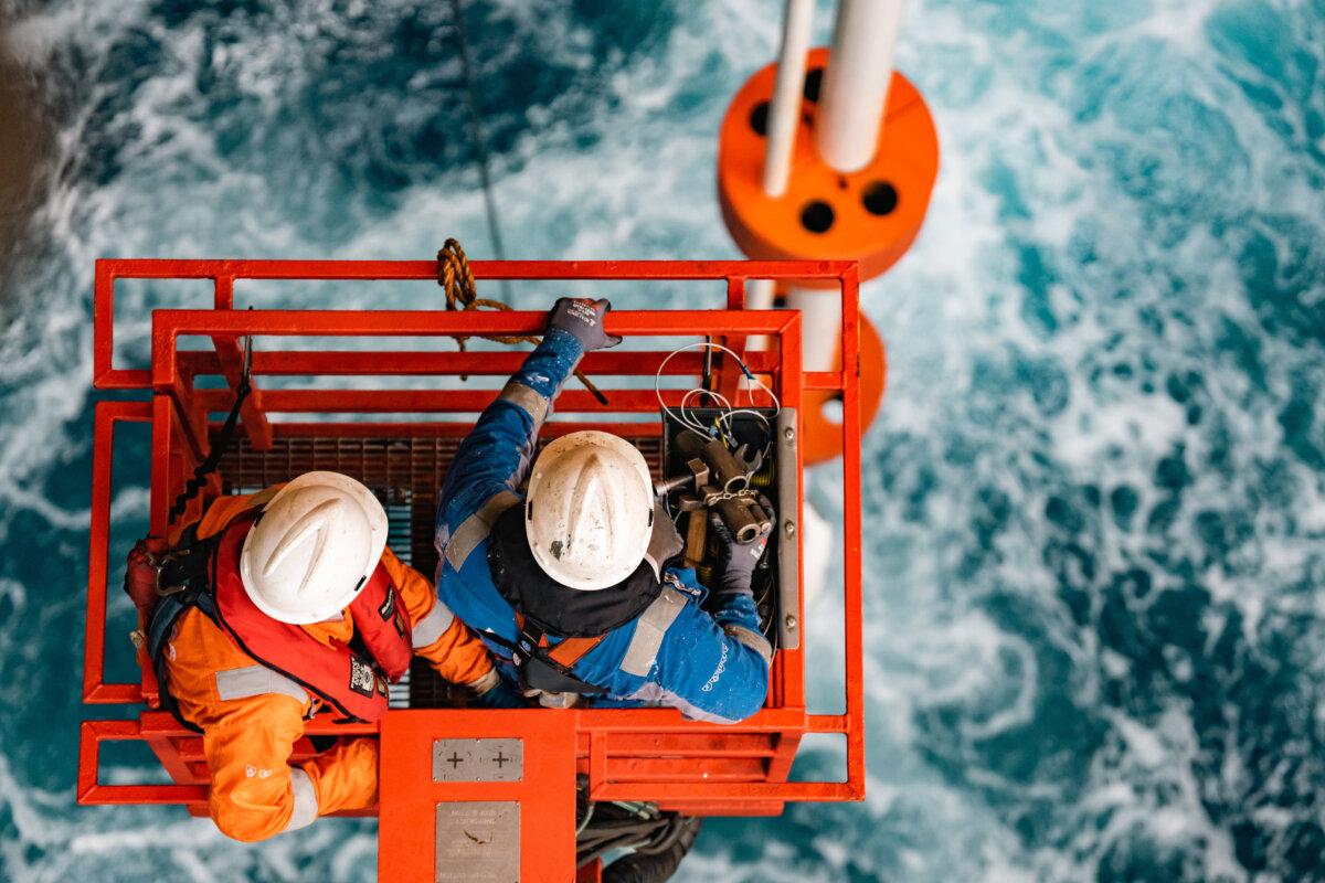 Engineers aboard Hidden ​Gem inspect the ​top ​of the 4-kilometer-long ​riser system, ​which ​is used ​to ​transport ​collected nodules ​to the surface on compressed air. (The Metals Company)