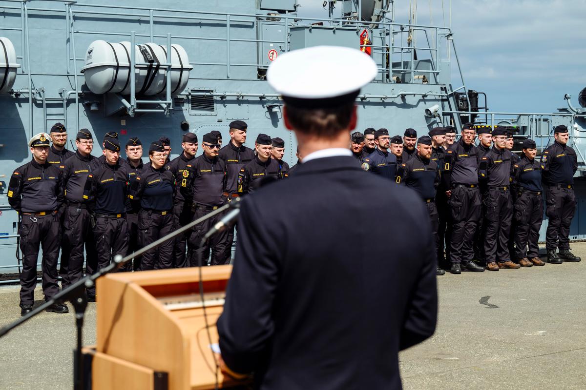 The commander of the fleet and support forces of the German navy, Axel Deertz, addresses the crew of the minesweeper Fulda before its departure for possible deployment in the Strait of Hormuz in Kiel, Germany, on May 4, 2026. (Gregor Fischer/Getty Images)