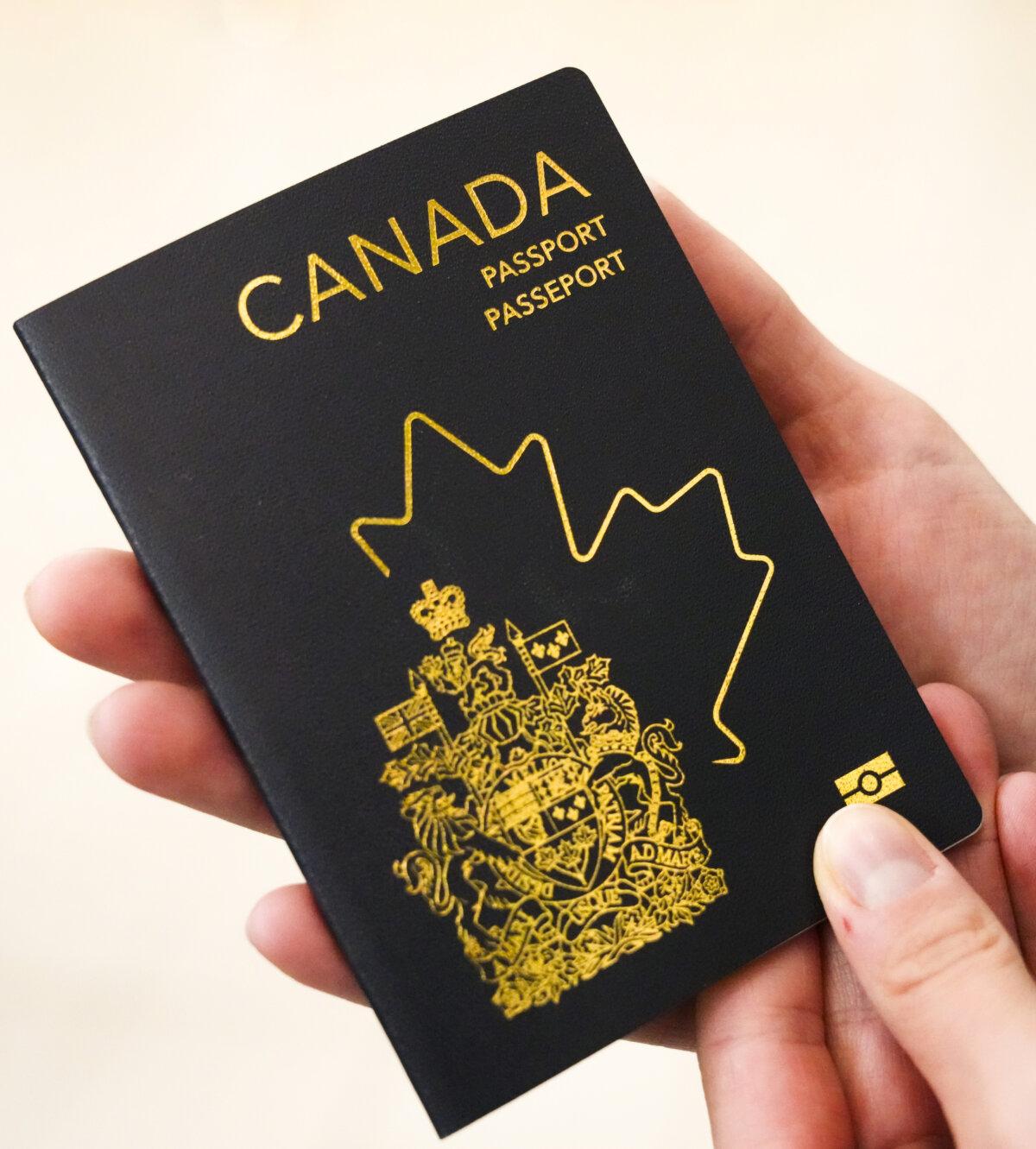 Photo of the new Canadian passport unveiled on May 10, 2023. (The Canadian Press/Sean Kilpatrick)