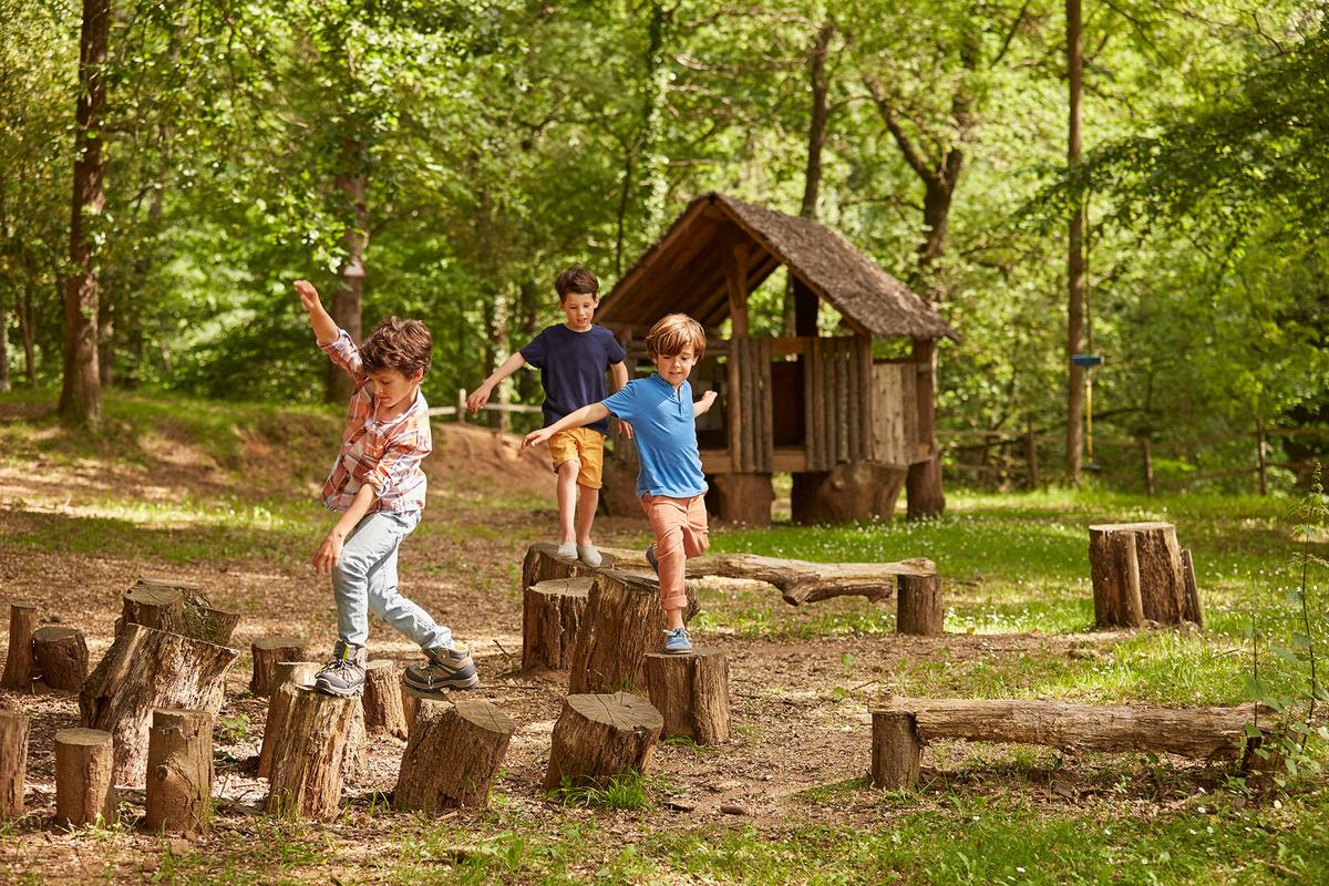 Unstructured outdoor play allows children to develop their creativity and problem-solving skills. (Morsa Images/Getty Images)