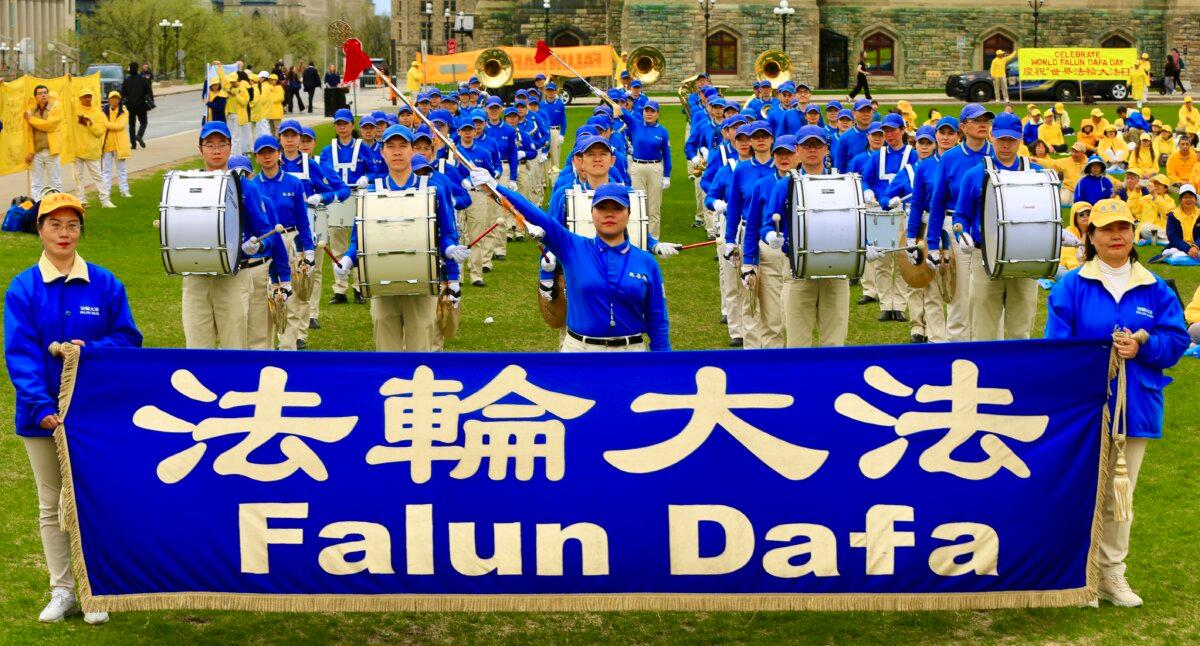 The Tian Guo Marching Band performs as part of activities to celebrate the World Falun Dafa Day on Parliament Hill, Ottawa, on May 5, 2026. (Jonathan Ren/The Epoch Times)