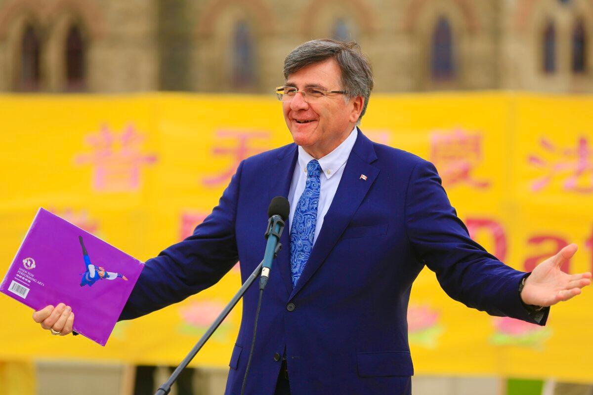 Conservative MP Costas Menegakis celebrates the World Falun Dafa Day on Parliament Hill, Ottawa, on May 5, 2026. (Jonathan Ren/The Epoch Times)