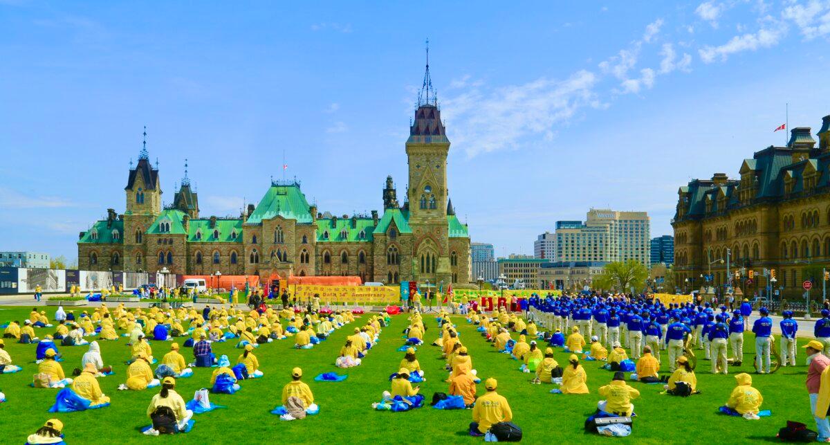 Falun Dafa hold an event to celebrate the World Falun Dafa Day on Parliament Hill, Ottawa, on May 5, 2026. (Jonathan Ren/The Epoch Times)