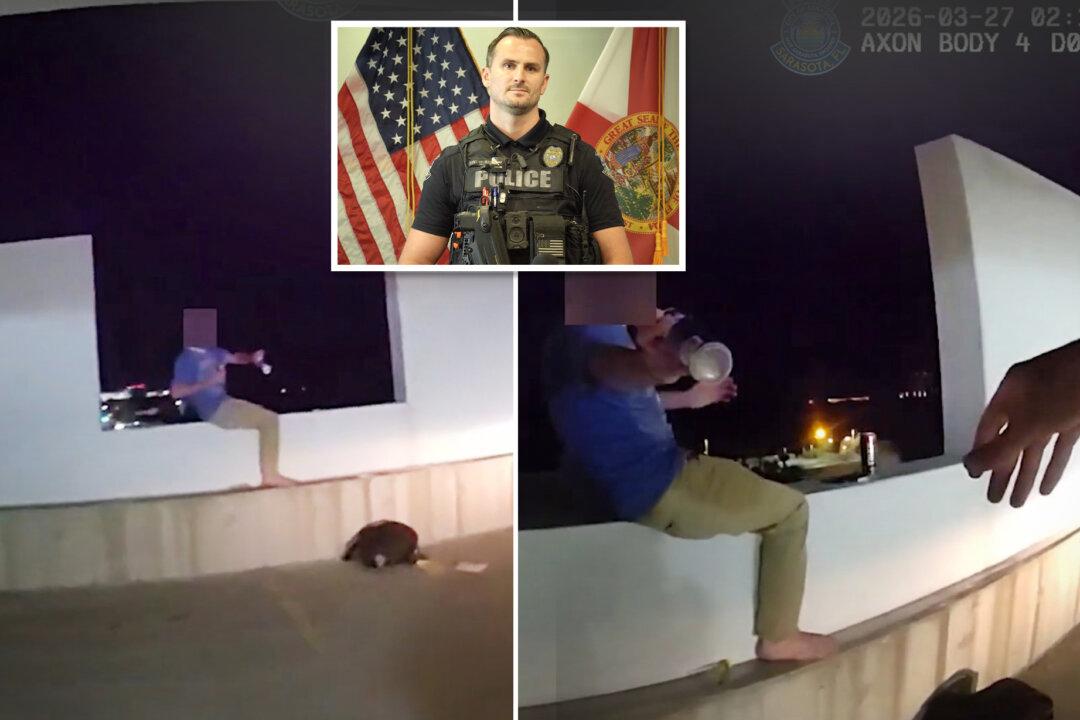 VIDEO: Sarasota Police Officer Talks Down Man in Mental Health Crisis About to Jump Off 6-Story Parkade