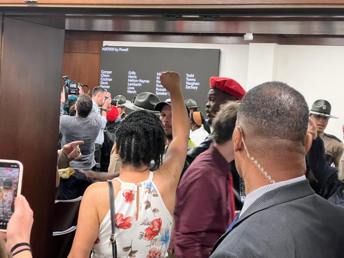 Protesters chanted and were escorted out of a hearing as state House lawmakers voted on an amendment to a new restricting proposal May 6, 2026. (Jacki Thrapp/The Epoch Times)