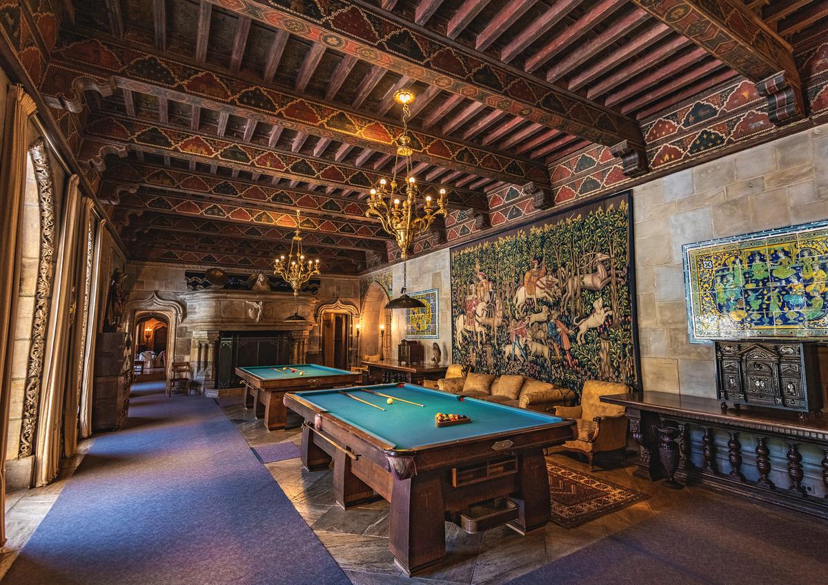 Designed for leisure and dressed for a museum, the Billiard Room's 15th-century Spanish ceiling, painted with scenes of courtly life, presides over a space hung with two tapestries from the legendary “Hunt of the Unicorn” series. The nearly 10-foot-tall tapestries were woven from wool and silk in France in about 1500. The remaining pieces in this series belong to the Metropolitan Museum of Art, making these among the rarest works outside Europe. (Abbie Warnock-Matthews/Shutterstock)