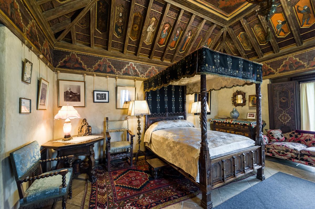 For all his extravagance, William Randolph Hearst's personal bedroom in Casa Grande was relatively restrained, although its ceiling ranks among the finest on the property. The polychrome wood ceiling, believed to originate from the Palacio de los Sánchez Muñoz in Teruel, Spain, transforms the room into something cathedral-like. To sleep beneath a 15th-century ceiling in a room on a California hilltop is, in many ways, the essence of Hearst's style. (gnohz/Shutterstock)