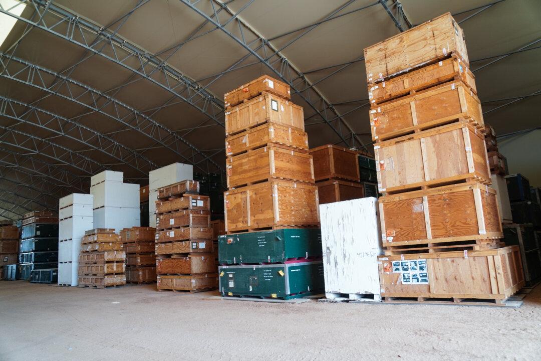 Boxes of tools used in aircraft parts manufacturing are stacked at Davis-Monthan Air Force Base in Tucson, Ariz., on April 21, 2026. More than 271,000 pieces of production equipment are stored on-site. (Allan Stein/The Epoch Times)