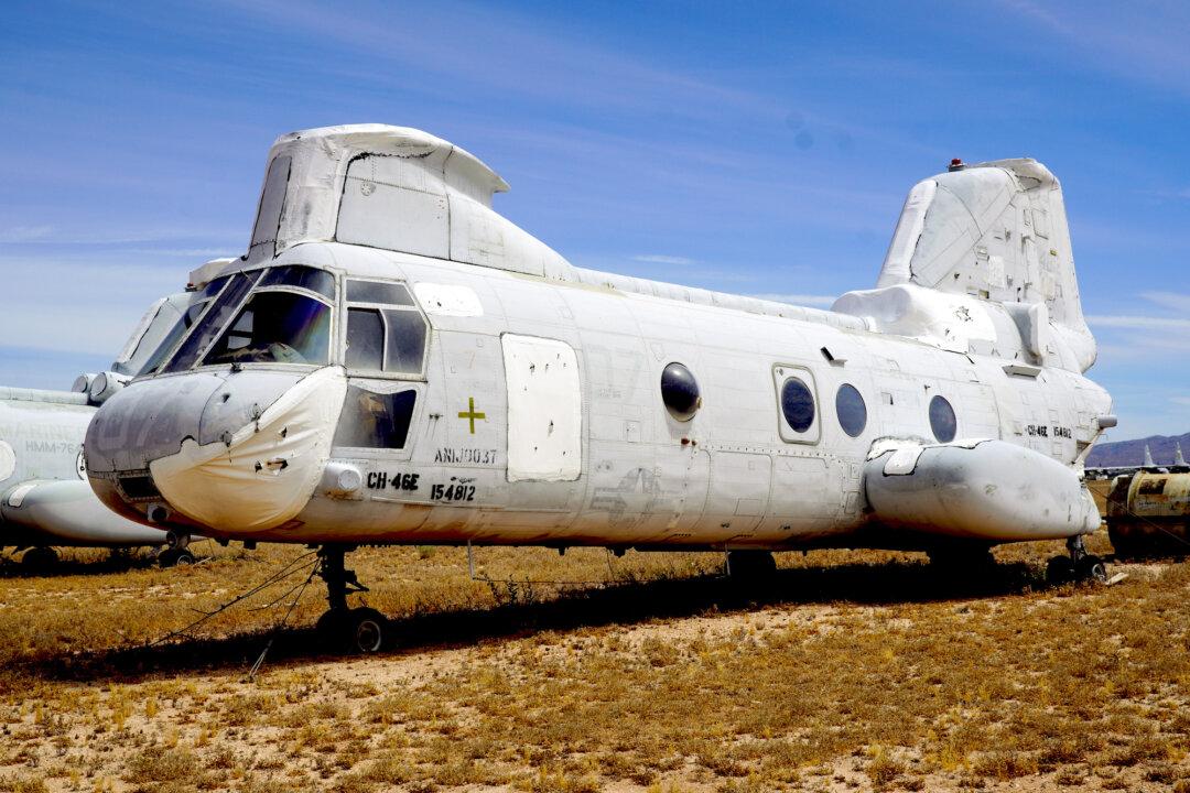 The remains of the helicopter used to evacuate Marines from the U.S. Embassy in Saigon, Vietnam, on April 30, 1975, are stored at Davis-Monthan Air Force Base in Tucson, Ariz., on April 21, 2026. (Allan Stein/The Epoch Times)