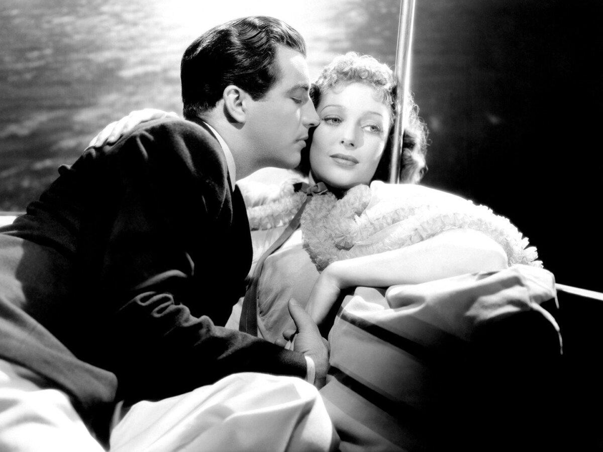 Richard Winfield (Robert Taylor) and Ellen Neal (Loretta Young), in "Private Number." (20th Century Fox)