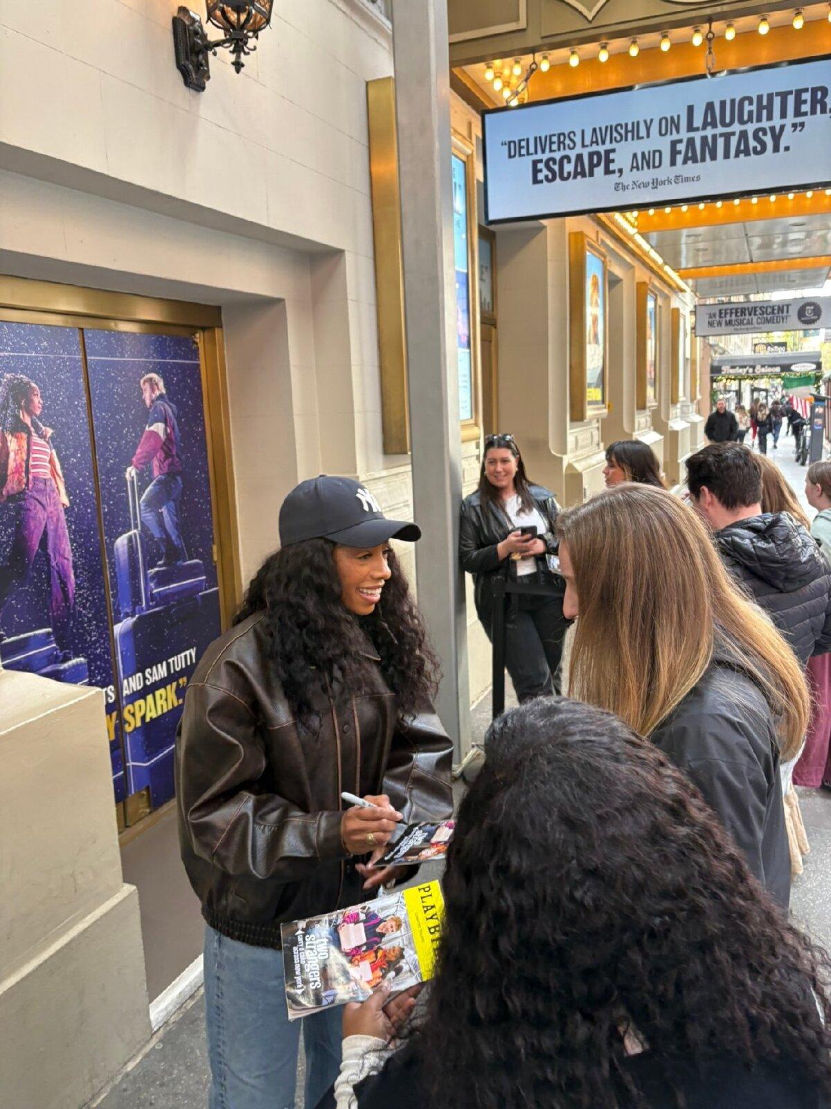 Tony-nominated actress Christiani Pitts signs autographs at the stage door after a performance of "Two Strangers (Carry a Cake Across New York)" in New York City's Theater District. (Alison Ramsey)