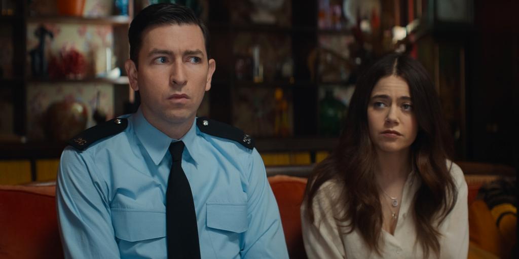 Town police officer Tim Derry (Nicholas Braun) and Rebecca Hampstead (Molly Gordon), in “The Sheep Detectives.” (Amazon MGM Studios)