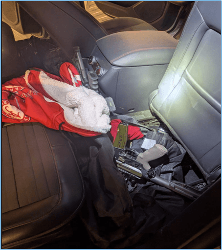 Rifles found in an SUV are seen in a handout photo from U.S. authorities. Three suspects have been charged with attempting to smuggle firearms into Canada. (U.S. Department of Justice)