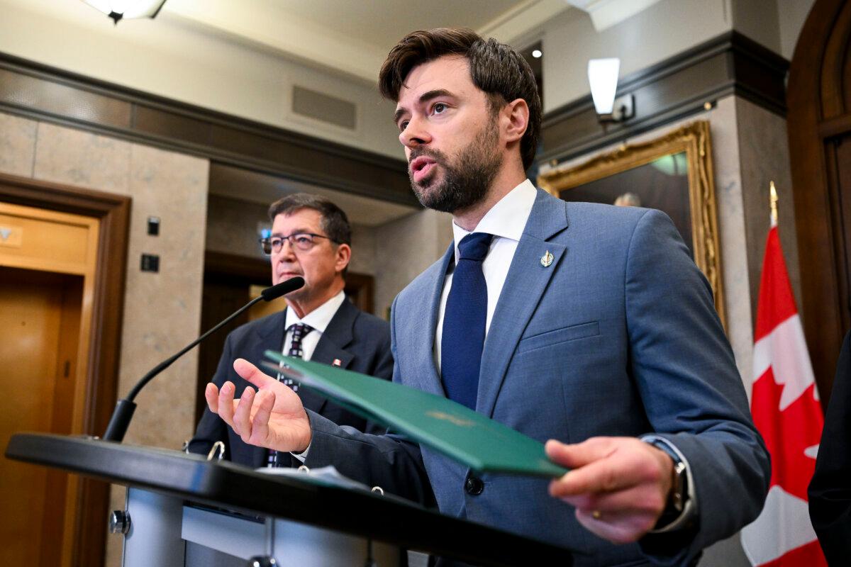 Conservatives MPs Matt Strauss (R) and Dan Mazier speak during a press conference in the Foyer of the House of Commons on Parliament Hill in Ottawa, on April 27, 2026. (The Canadian Press/Spencer Colby)