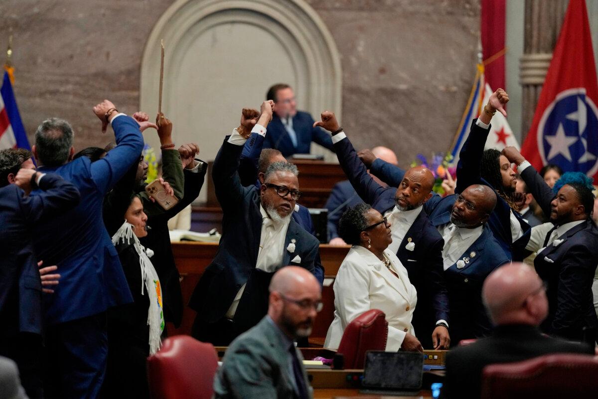 House Democrats gesture on the chamber floor as they vote against a bill to redraw U.S. congressional voting maps during a special session of the state legislature in Nashville on May 7, 2026. (George Walker IV/AP Photo)