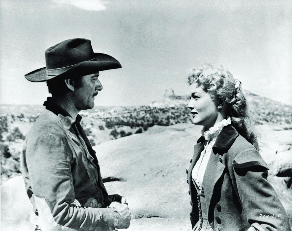 Capt. Lafe Barstow (Errol Flynn) and Johanna Carter (Patrice Wymore), in “Rocky Mountain.” (Warner Bros. Pictures)