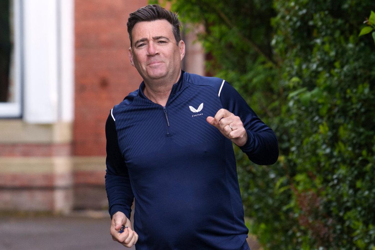 The Labour mayor of Greater Manchester, Andy Burnham, on a morning run in Manchester, England, on May 18, 2026. (Jon Super/AP Photo)