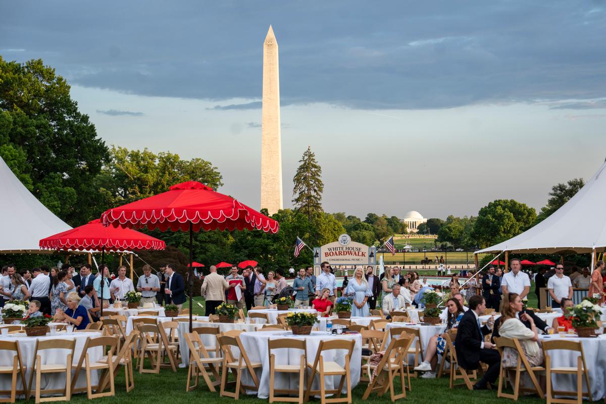 Attendees during the annual Congressional Picnic on the South Lawn of the White House on May 19, 2026. (Madalina Kilroy/The Epoch Times)