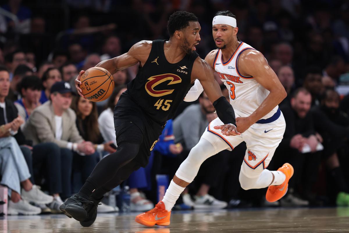 Donovan Mitchell (45) of the Cleveland Cavaliers drives around Josh Hart (3) of the New York Knicks during the third quarter in Game One of the NBA Eastern Conference Finals at Madison Square Garden in New York City on May 19, 2026. (Sarah Stier/Getty Images)