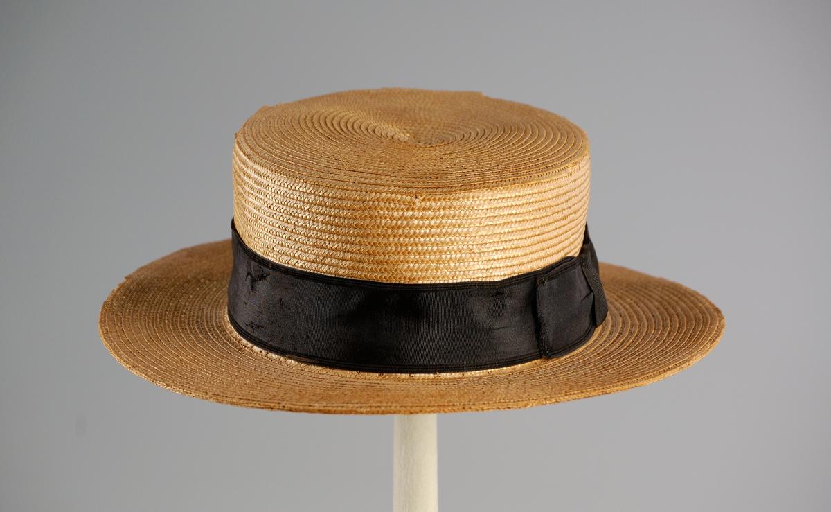This circa 1890 boater was made in America from straw and silk. The straw boater was the defining hat of the Victorian summer, its crisp, flat crown signaling leisure and ease. Brooklyn Museum Costume Collection at The Metropolitan Museum of Art, New York City. (Public Domain)