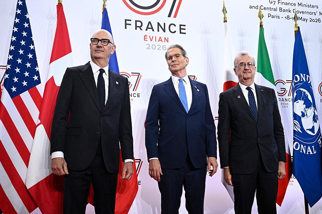 French Economy, Finances, and Industry Minister Roland Lescure (L) and Governor of the Bank of France François Villeroy de Galhau (R) greet U.S. Secretary of the Treasury Scott Bessent prior to a meeting of G7 finance ministers and central bank governors in Paris on May 18, 2026, in preparation for the June summit in Evian. (Julien De Rosa/AFP via Getty Images)