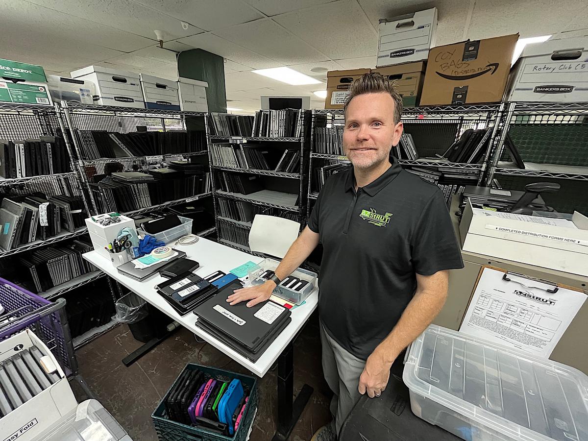Jared Bodine, executive director of Arizona StRUT shows the workspace where old technology is brought back to life in Tempe, Ariz., on May 20, 2026. (Allan Stein/The Epoch Times)