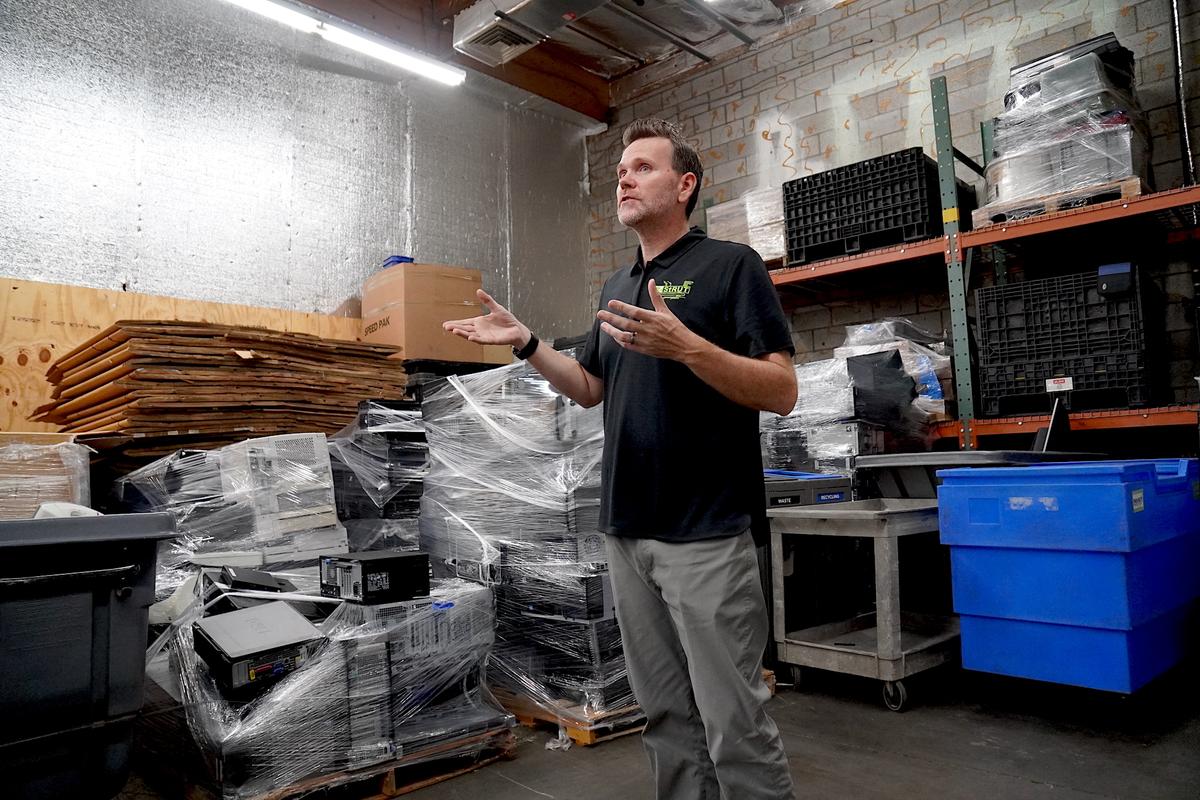 Jared Bodine shows a portion of the warehouse at Arizona StRUT in Tempe, Ariz., on May 20, 2026. (Allan Stein/The Epoch Times)